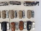 Leatherman Mini-Multi Tools (most) with Cases.  1 Lot = Est 28 pieces 